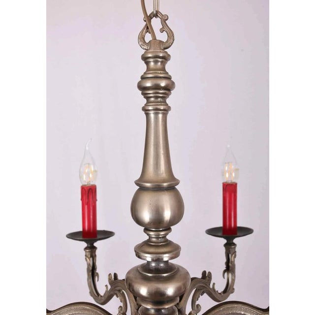 White metal chandelier in renaissance style. Restored electrical installation: new cables and sockets - ready to use....