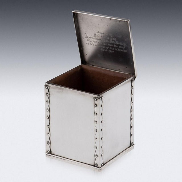 19th century indian colonial silver tea caddy shaped as a tea chest. Of square form, imitating a tea chest, with metal...