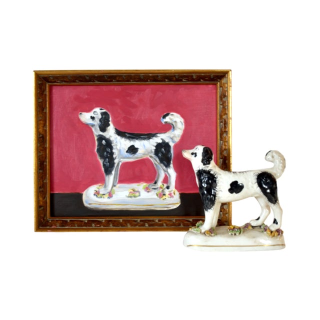 An antique, c. 1840s-1850s Victorian Staffordshire water spaniel dog, white with black spots, standing on a base with...