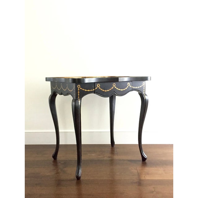 'Avignon Table' in style of a provincial Louis XV black and gilt tray-top table. (Please note that the top won't come...