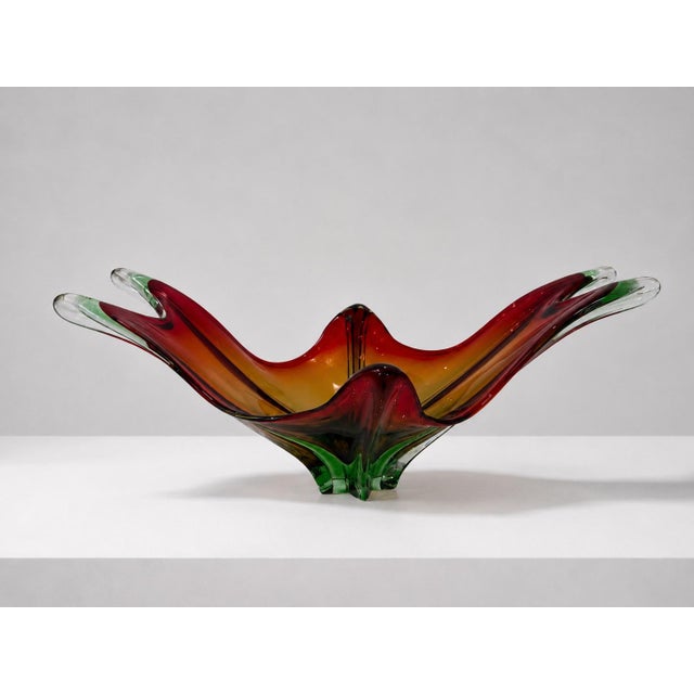 Exceptional large-scale vintage art glass centerpiece in vibrant red, orange, and green, featuring dramatic sculptural...