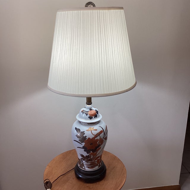 The Frederick Cooper Ceramic Ginger Jar Table Lamp is a vintage piece hand-painted with a beautiful floral motif. This...