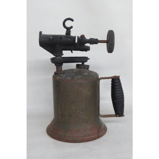 This amazing Blow Torch is made of metal. This piece has wonderful classic Traditional style from the early 1900's, it is...