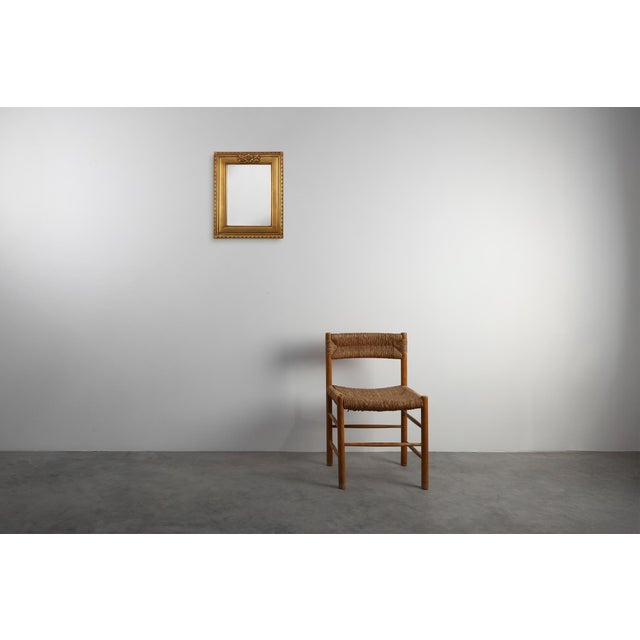 This Belgian Deknudt mirror from around 1950 is a refined example of mid‑20th‑century decorative design, created by one of...