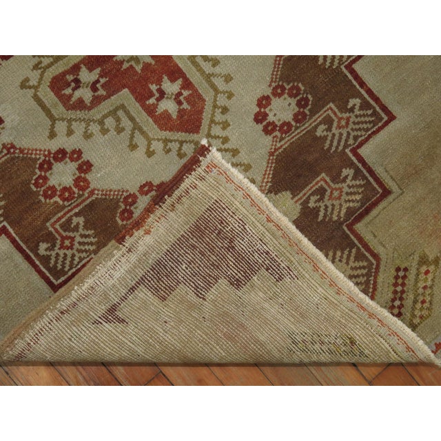 A Vintage Turkish Anatolian small square rug from the middle of the 20th century 3'2'' x 4'3''