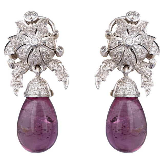 Diamond wt 1.23cts semi precious wt 26.36cts gold net wt 11.392gm(18k) Its very hard to capture the true color and luster...