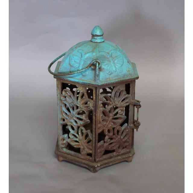 Vintage Japanese cast iron butterfly tea garden lantern with pierced openwork panels and a beautifully weathered turquoise...