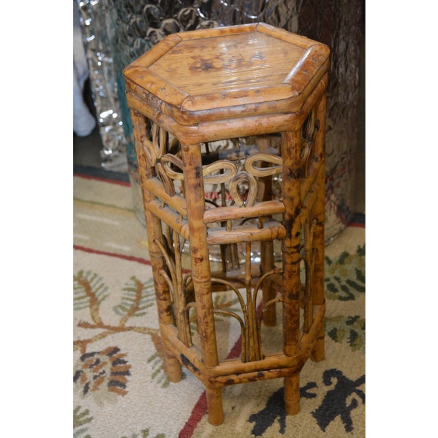 Great little table or plant stand. Bamboo, hexagon shaped. Appears to be a faded label underneath.