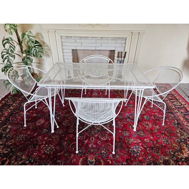 An MCM Wrought Iron Radar Chair and Table Set, attributed to Mario Tempestini by Santorini. The 5 piece set includes 4...