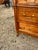 An elegant 19th-century French Louis XVI commode, crafted from solid walnut with beautifully figured walnut veneer. This...