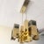 Striking mid century modern chandelier attributed to Robert Sonneman, featuring a bold geometric composition in warm brass...