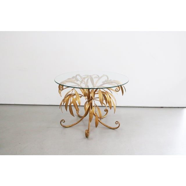 Florentine coffee table / side table Hollywood Regency style by Hans Kögl 1970s Palm leaf design Diameter 65 cm Height 45...
