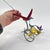 Early 20th Century Vintage African Wire Push Toy Galimoto Bicycle with Moving Hummingbird MATTER COLLECTION For Sale In Denver - Image 6 of 8