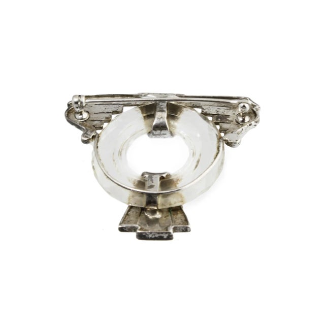 Art Deco brooch with marcasite design around a faceted crystal circle. No maker's mark. Please see the measurements noted...