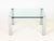 Italian Chrome and Glass Top Coffee Table. 16.25" H x 32.25" W x 32.25" D. Provenance: From the Estate of Gerard Stora,...