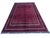 Afghan Turkmen rug, hand knotted in Afghanistan from 100% wool. Measuring 8’3” x 11’, this rug features a rich burgundy...