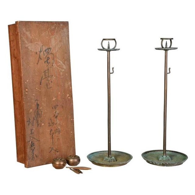 This pair of bronze metal Japanese have a straight shafts with threaded ends, hanging hooks for candle snuffers, pricket...