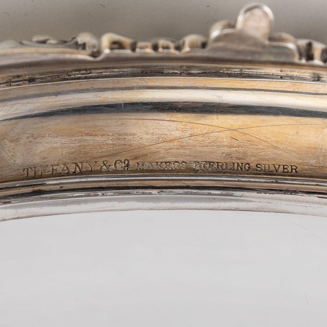 A 20th century american solid silver & glass bowl made by the world renowned tiffany & co. The glass is plain and of a...