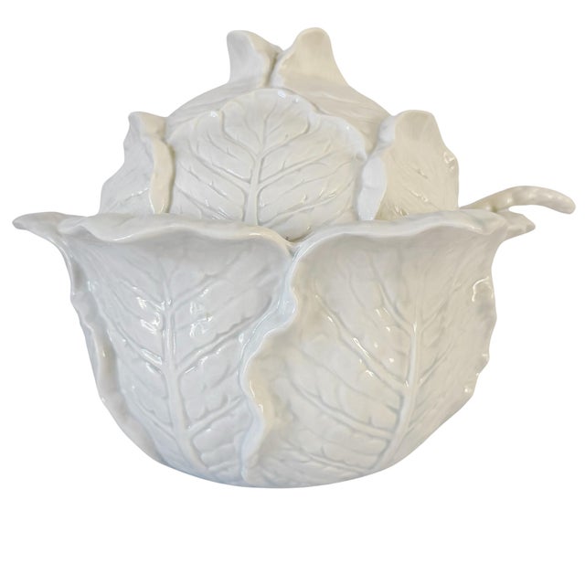 This rare vintage Fitz and Floyd white cabbage soup tureen set pairs sculptural art with dining utility. The tureen is...