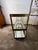An entertainer's dream, simple yet sophisticated. A stunning, high quality bronze, glass and mirror mid century bar cart...