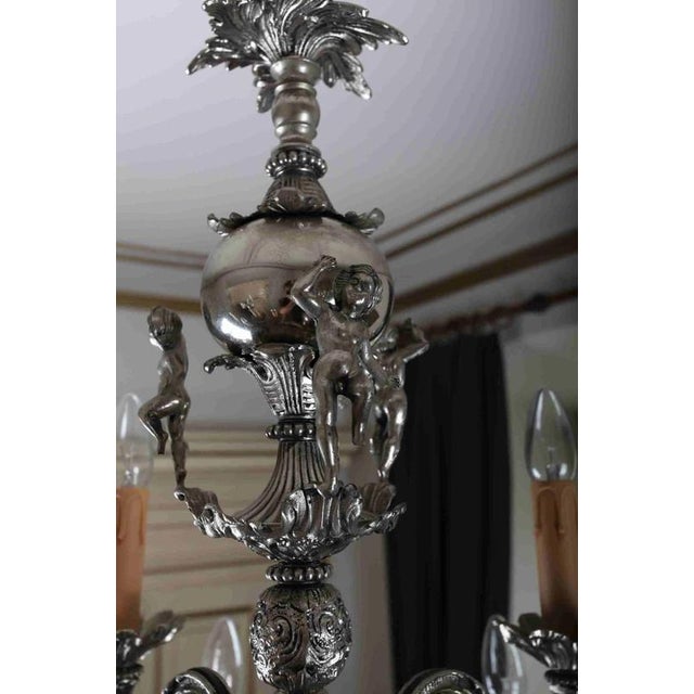 Figural 2-Tiered 12-Armed Chandelier For Sale - Image 4 of 7