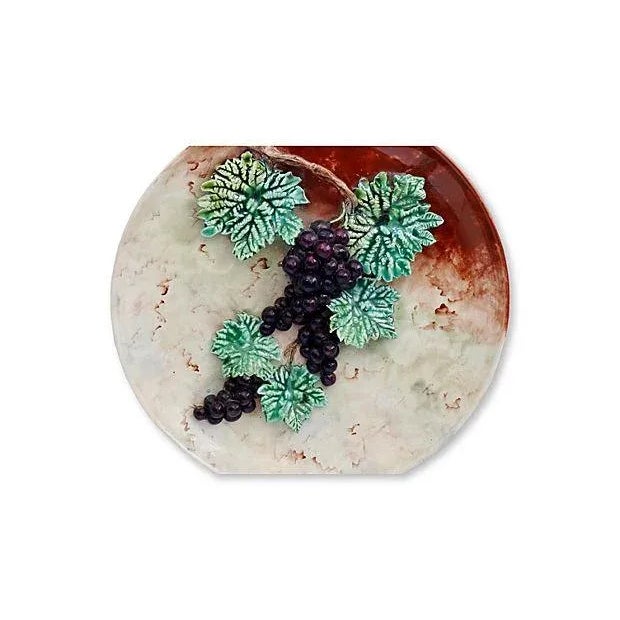 Antique French trompe l’oeil majolica wall charger with raised grape and leaf detailing. This is a fairly rare piece for...