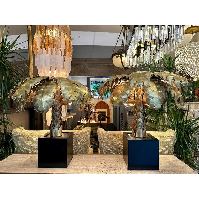 A large pair of Maison Jansen Palm Tree table lamps, 2 pairs available. In as new condition after being purchased from a...