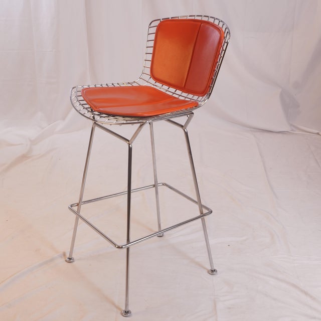 This set of three Knoll Bertoia Bar Stools, designed by Harry Bertoia, features the iconic sculptural wire form that...