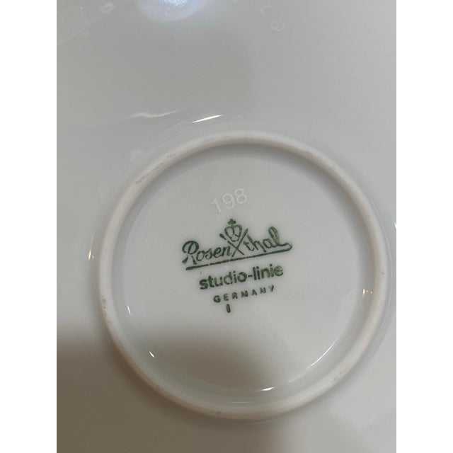 Elegant Rosenthal Studio-Linie porcelain chop plate featuring a refined minimalist design with deep black banding and...