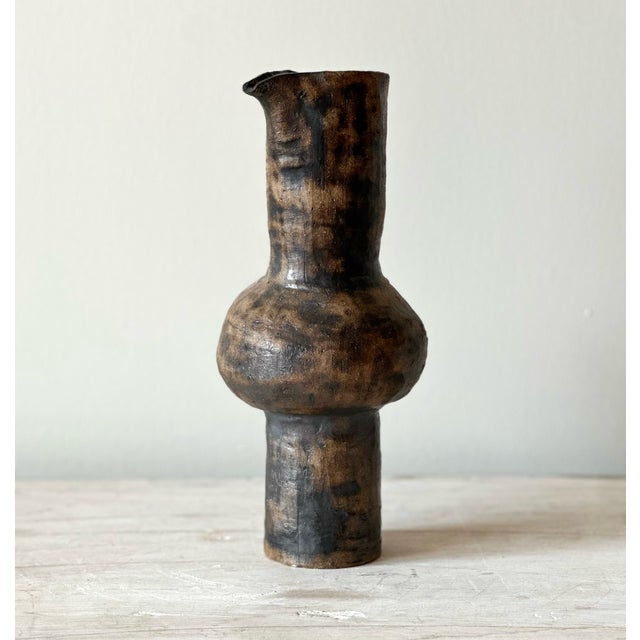 VESSEL - MANANTIAL stoneware with glaze A handbuilt vessel in black clay with an iron oxide wash worked across the surface...