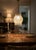A vintage Italian pendant light dating from the 1970s, featuring a sculptural shade composed of multiple hand-blown Murano...