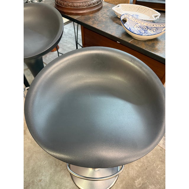 This matching pair of authentic "Bombo" adjustable swivel bar stools was designed by Stefano Giovannoni for the Italian...
