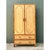 This vintage bamboo and rattan armoire pairs tropical, organic materials with a clean, architectural silhouette, ideal for...
