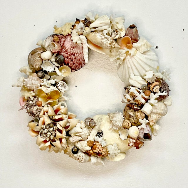 We love seashell encrusted decor pieces and this Coastal Chic little wreath is fabulous. It has several colorful shells...