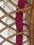 Mid century elegant rattan bamboo mirror by Italian designer Franco Albini. Decorated with burgundy red velvet sash and...