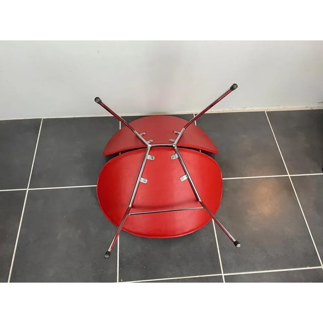 Red skai chair chrome feet 80s Some bites and defects on the skai Height 71cm Sitting height 35cm Width 63cm Depth 62cm...