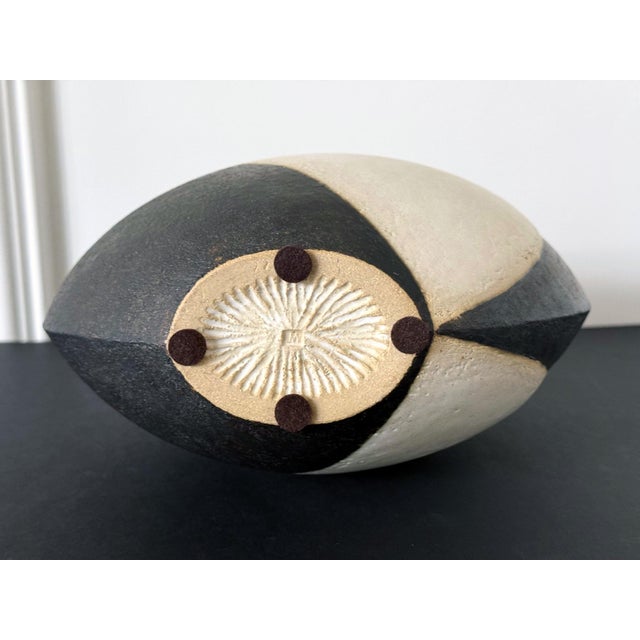 A large stoneware glazed bowl in a rare leaf form by British studio potter John Ward (1938-2023) circa last quarter of the...