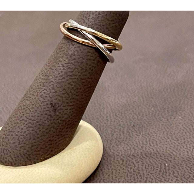 Trinity Tri-Color White, Yellow Gold and Rose, 14 Karat Gold Rolling Rings Italy For Sale In New York - Image 6 of 18