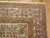 Rare size east Turkestan rug from the middle of the 20th century. The field is gray, accents in pink, copper and green....