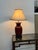 Design Plus Gallery presents an Asian Influenced Table Lamp with Oxblood Ceramic Urn Shape and Rosewood Base. The table...
