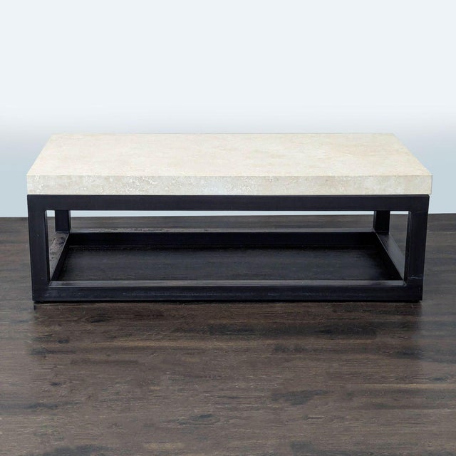 Travertine top on a metal base. Brand: Kreiss. Dimensions (in): 60W x 30D x 21H.