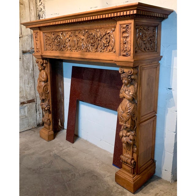 Stately, late 19th century, Renaissance Revival style, ornately carved oak fireplace mantel having male and female...