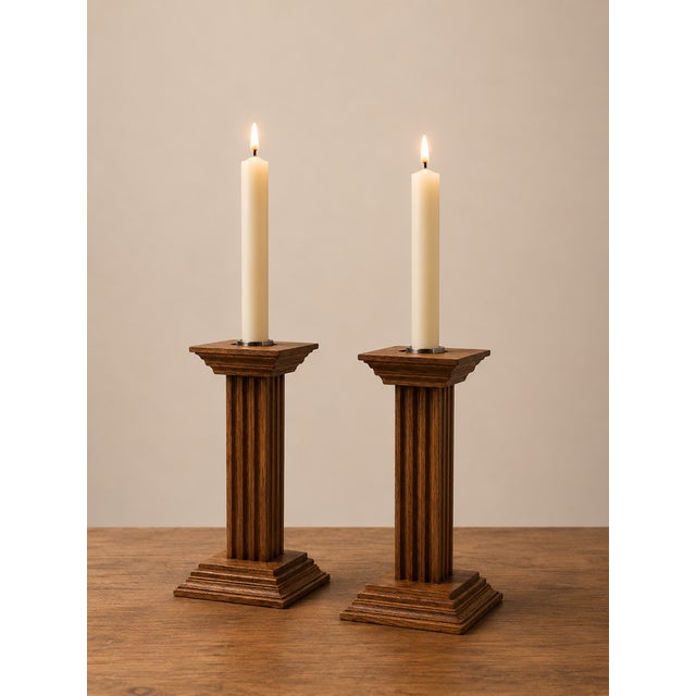 Elegant pair of monumental candlesticks made from solid oak, produced by the famous Dutch manufacturer Meubelfabriek...