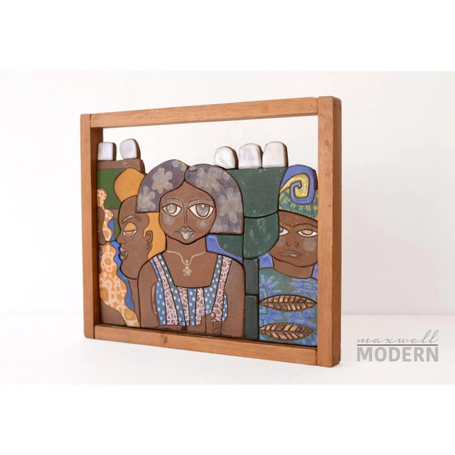 Gorgeous vintage piece of ceramic wall art encased in a wooden frame depicting possibly an African American Harlem subject...