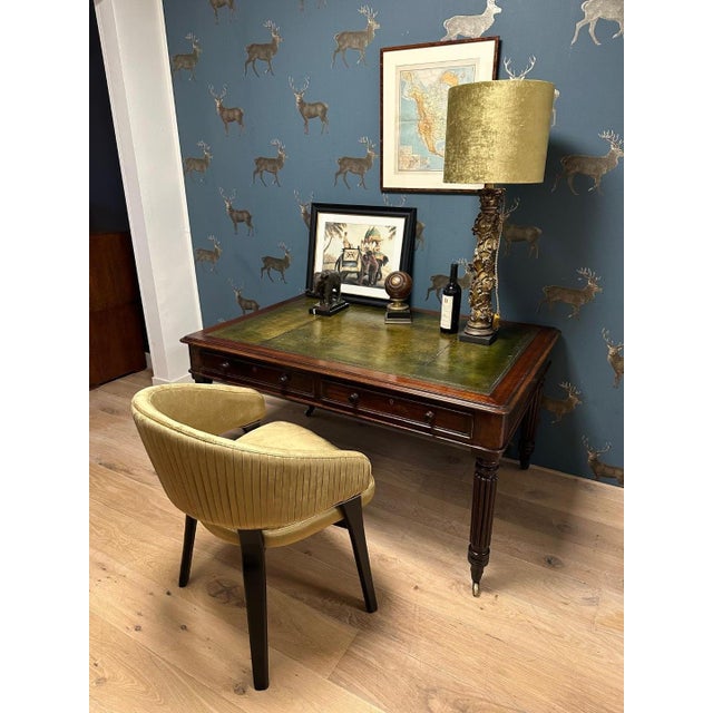 Beautiful antique mahogany writing table with 2 drawers on both sides. This means that the table can also be used by 2...