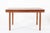 This unique vintage mid century English modern extendable teak dining table by White and Newton was made in England circa...
