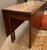 Antique Drop Leaf Cherry Dining Table with Turned Legs. There are a total of 6 legs. Two of the legs swivel to hold up the...