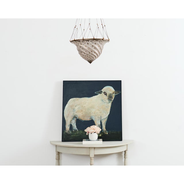 Dreamy pair of late 19th/early 20th century Swedish painted pine demilune console tables or round center table. Crafted in...