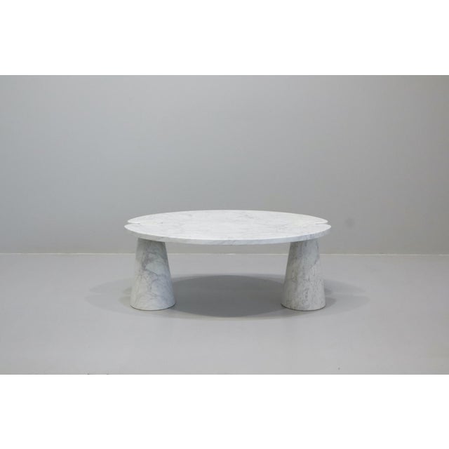Carrara marble coffee table with top resting on conical bases, designed by Angelo Mangiarotti for Skipper, belonging to...