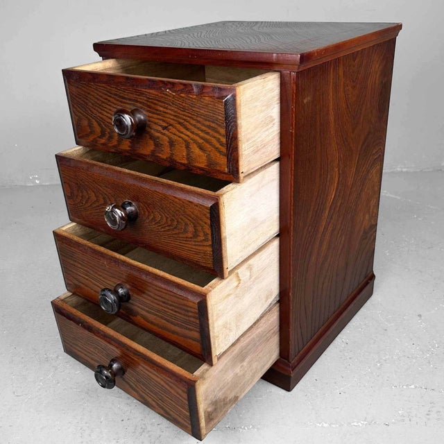 Small vintage chest with four drawers from Japan. Dimensions: height 53.5 cm, width 37 cm, depth 34 cm. The drawers are...